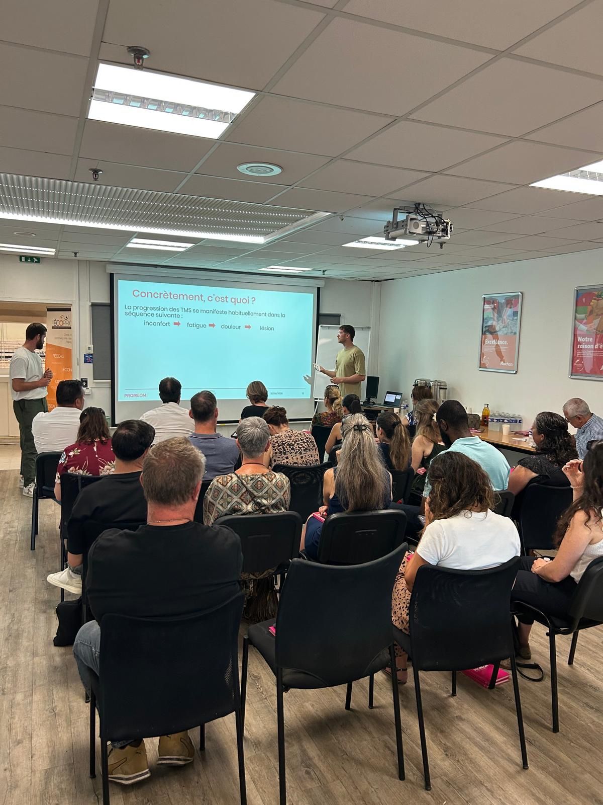 Ptit dej TMS Ecopriots conférence Conférence sur la prévention des TMS en entreprise lors du P'tit Déj des Ecopriots avec Promeom à Auchan Saint-Priest